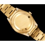 Navigator series men's watch, white dial, gold bezel, 42mm, gold Oyster bracelet.